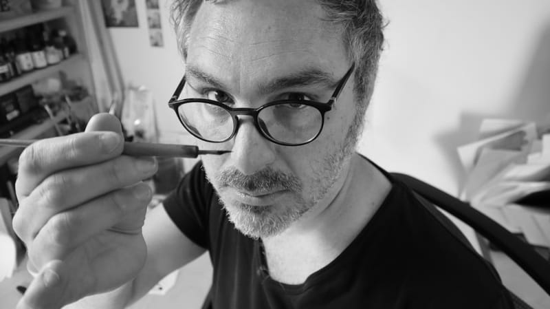 L'artiste dessinateur de BD Alfred.