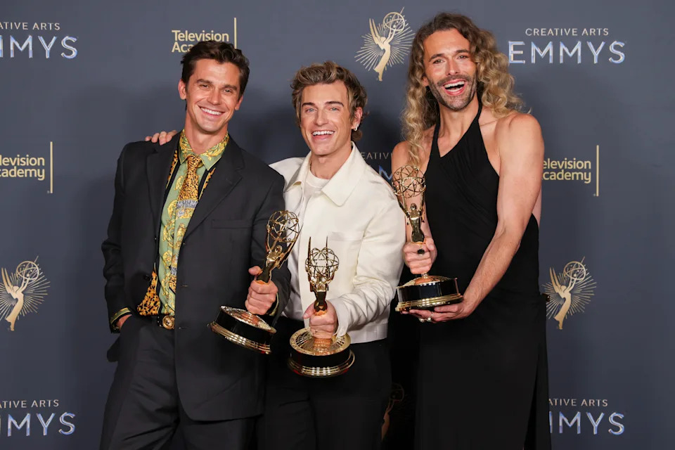Antoni Porowski, from left, Jeremiah Brent and Jonathan van Ness with their Emmy for Outstanding Structured Reality Program for "Queer Eye" in the press room during night two of the Television Academy's 2025 Creative Arts Emmy Awards at the Peacock Theater on Sunday, Sept. 7, 2025 in Los Angeles. (Photo by Mark Von Holden/Invision for the Television Academy/AP Content Services)