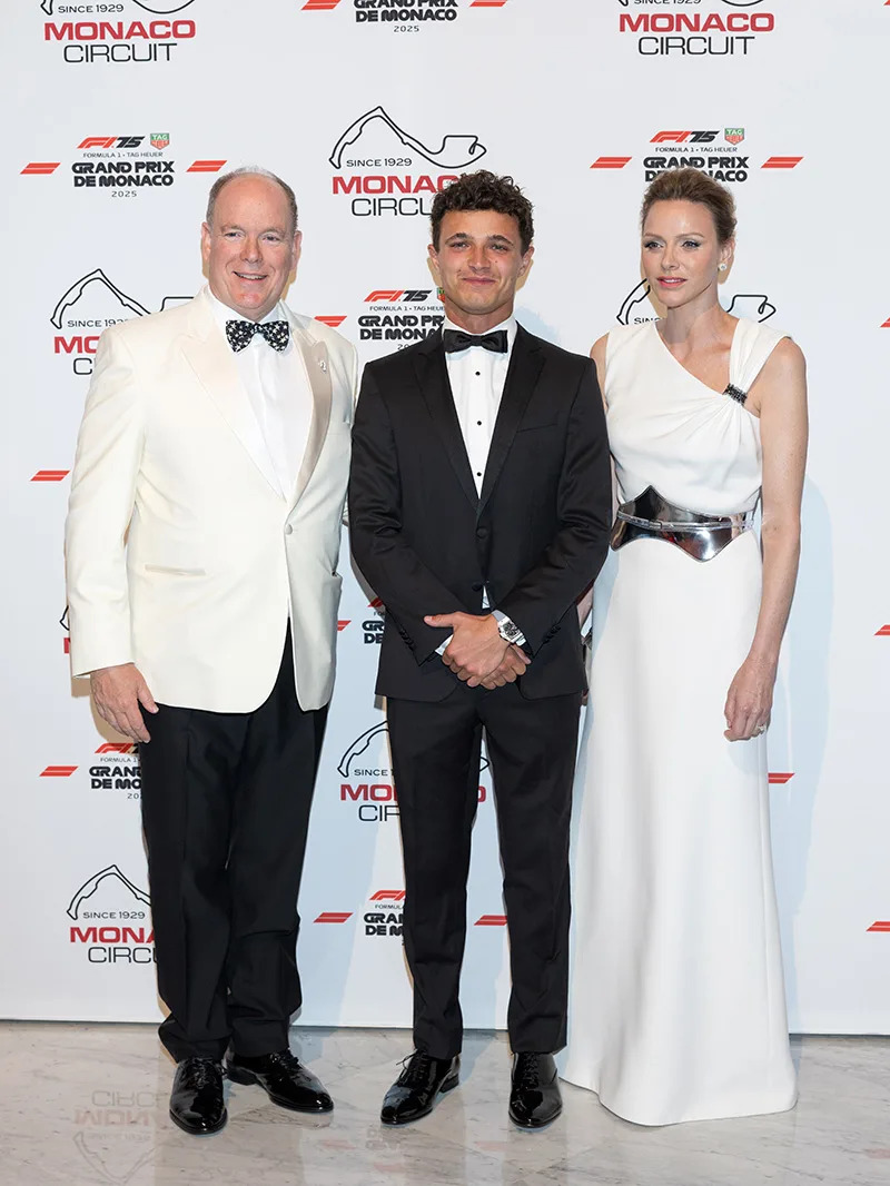 MONACO, MONACO - MAY 25: (EDITOR'S NOTE : NO TABLOIDS WEB & PRINT, NO DAILY MAIL, NO DAILY MAIL GROUP, NO BILD, NO CHI, NO VOICI, NO CLOSER) HSH Prince Albert II of Monaco, Lando Norris and HSH Princess Charlene of Monaco attend the Gala Dinner For The F1 Grand Prix Of Monaco on May 25, 2025 in Monaco, Monaco. (Photo by Arnold Jerocki/WireImage)
