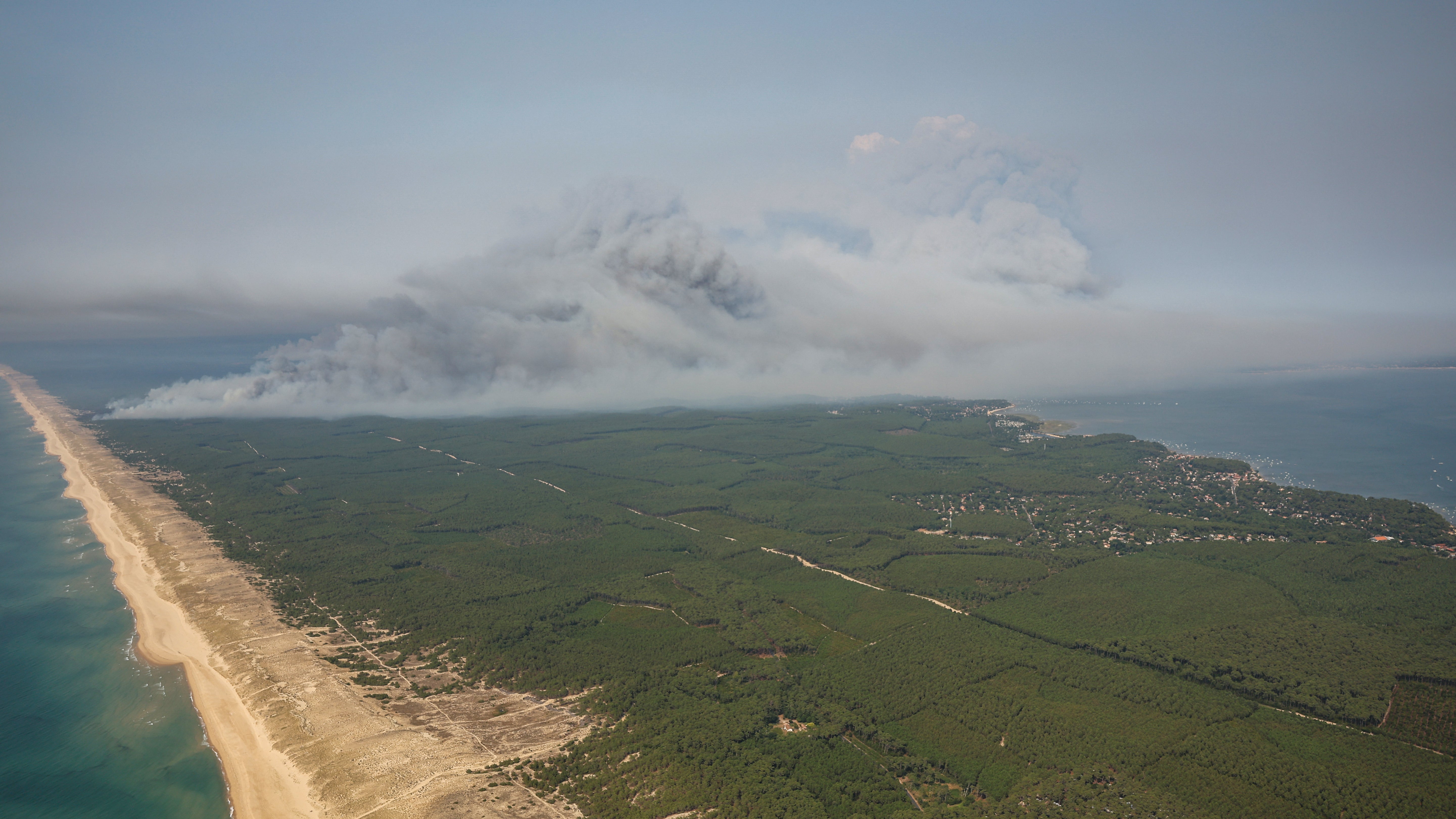 Smoke is seen billowing from the French fires