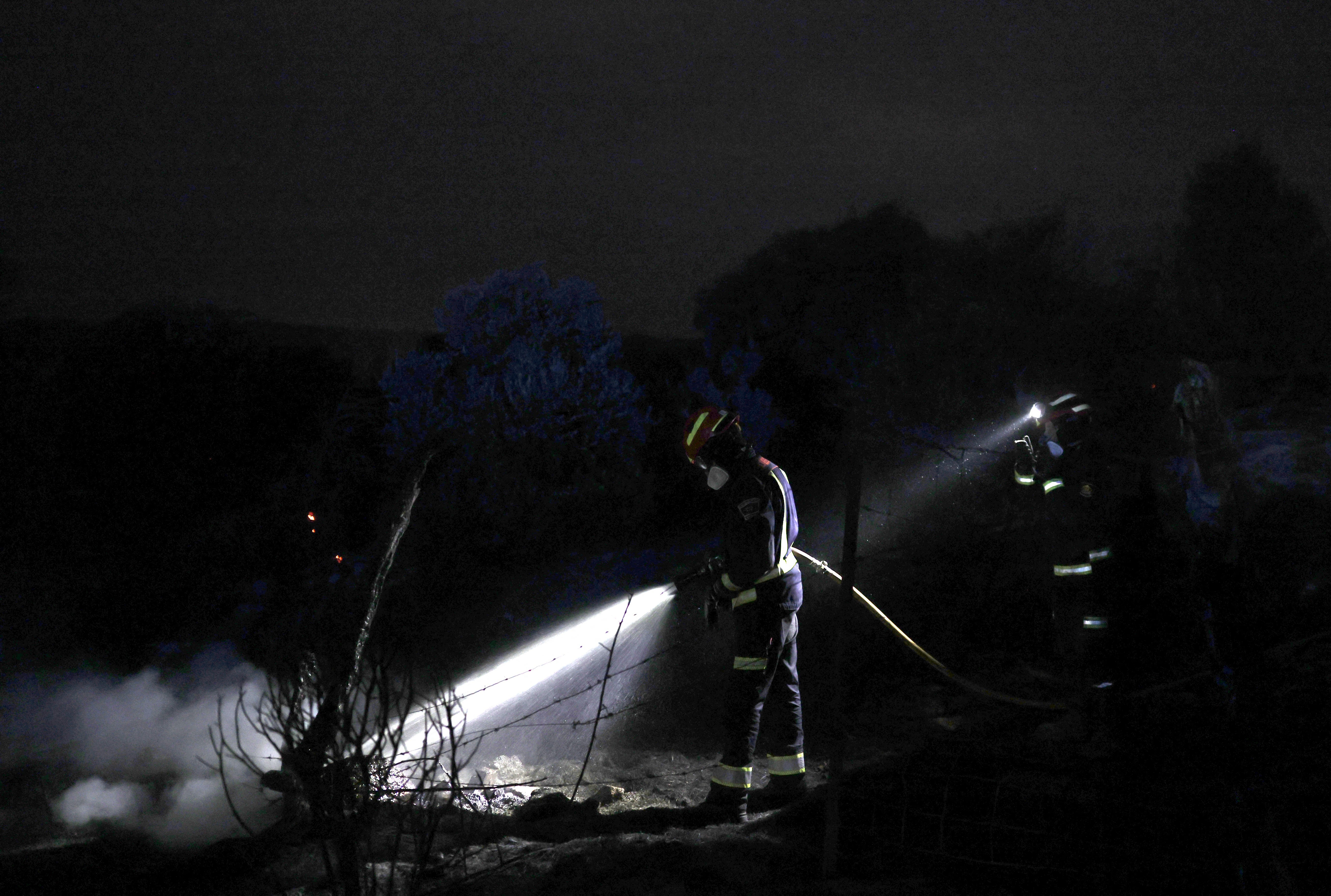 Firefighters worked through the night in Fresnedillas, Spain