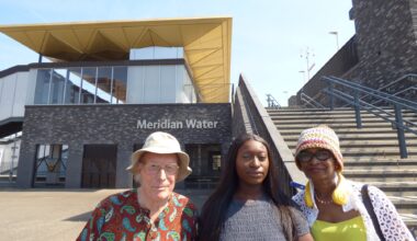 Outside Meridian Water Station, from left; React chair Alf Linney, Meridian One Homeowners Association chair Ebony Lartey, and React vice-chair Cellina Doswell