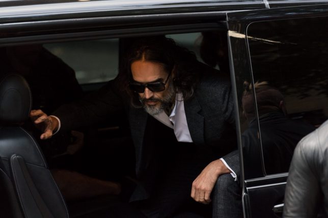 LONDON, UNITED KINGDOM OCTOBER 12, 2026: British comedian Russell Brand arrives at Southwark Crown Court to stand trial on charges of three counts of rape, three counts of sexual assault and one count of indecent assault, to all of which he pleaded not guilty and denies the allegations againt him, in London, United Kingdom on October 12, 2026. (Photo credit should read Wiktor Szymanowicz/Future Publishing via Getty Images)