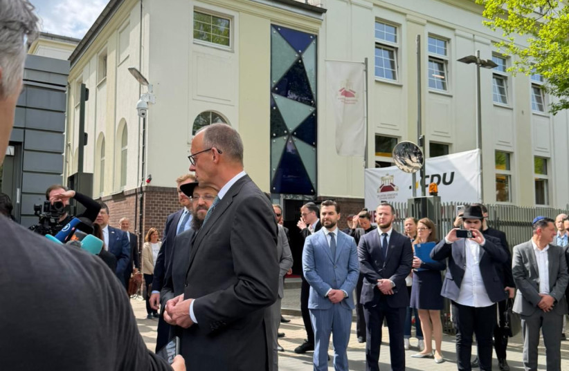 German Chancellor Friedrich Merz with Berlin's Chabad rabbi, Rabbi Yehuda Teichtal.