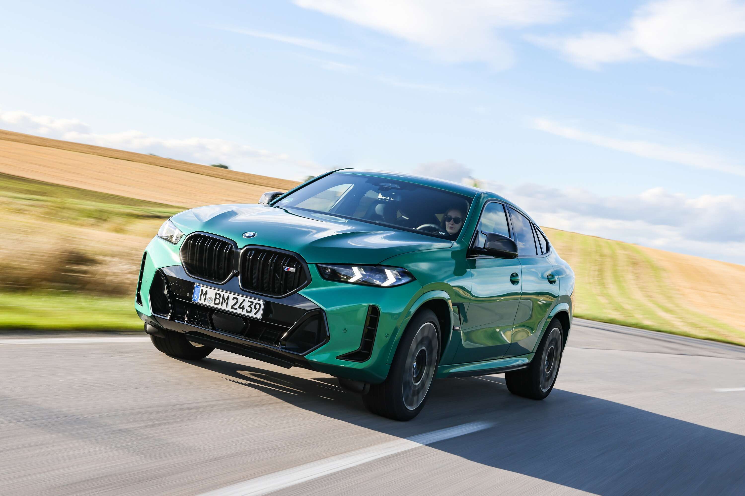 <p>The X6 M60i features BMW Operating System 8.5 on a curved display with a 12.3-inch instrument cluster and a 14.9-inch touchscreen.</p>