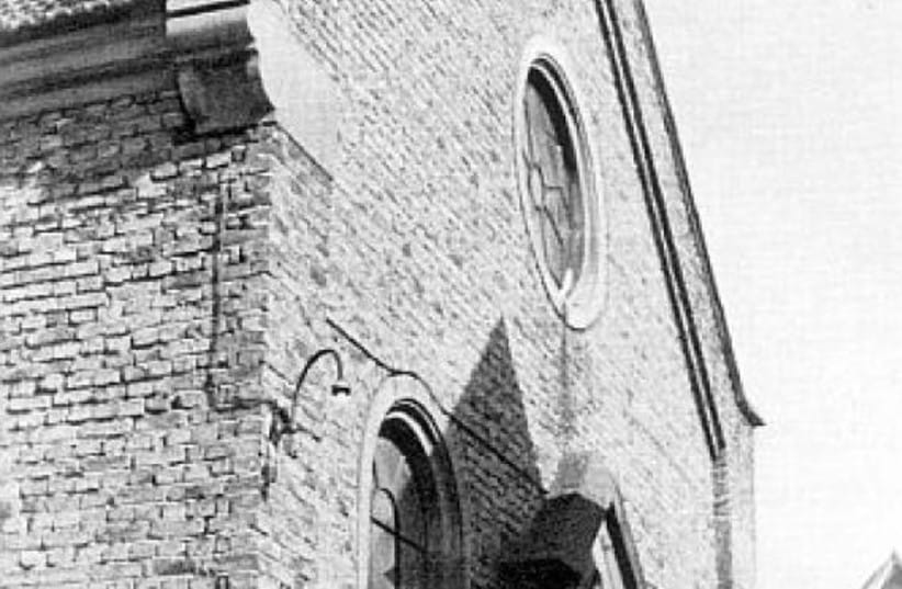Eich Synagogue. Note the shul was not destroyed on Kristallnacht and is still standing today, with the original stone Ten Commandments from 1889 on the roof.