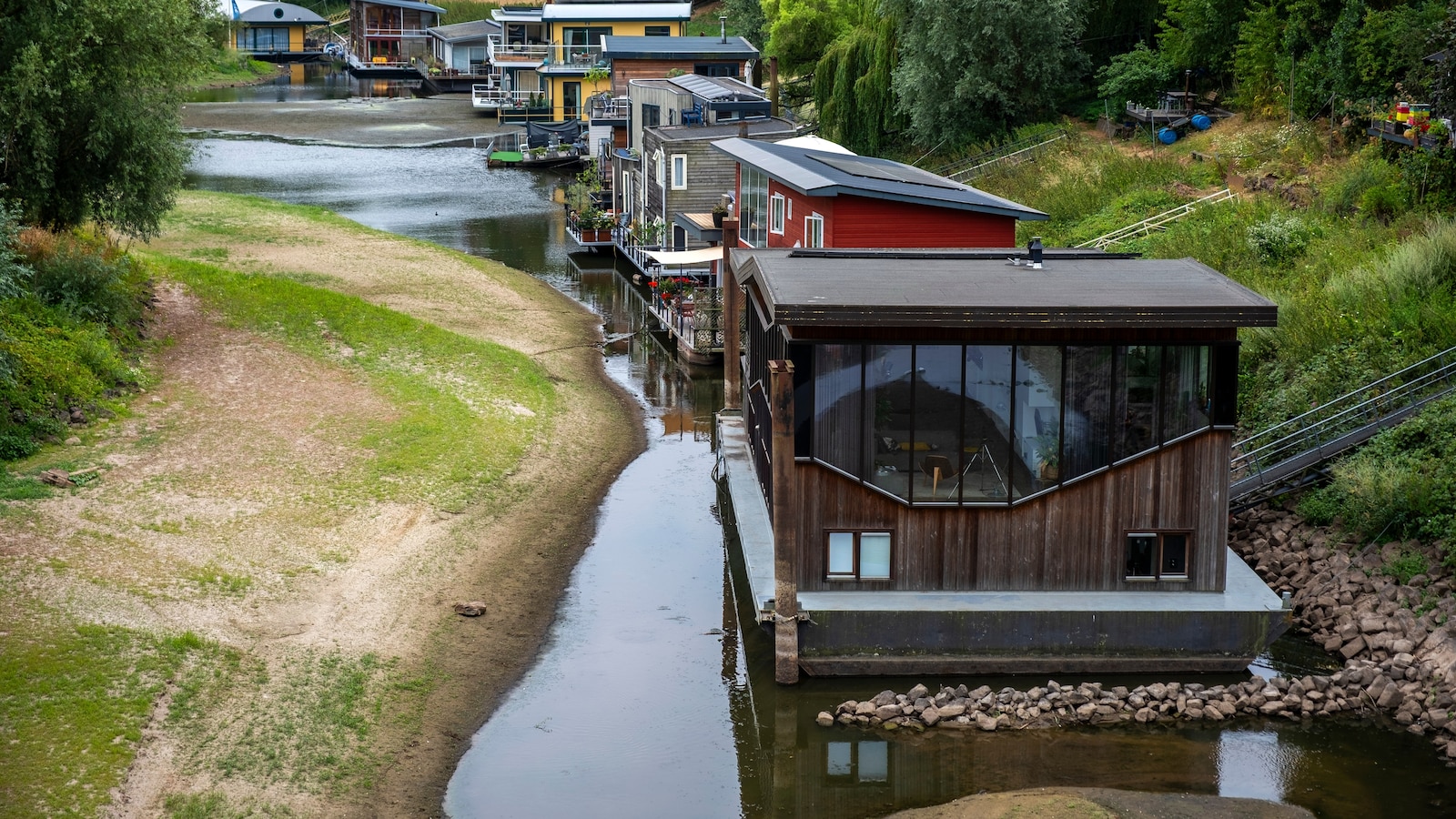 Dry, hot summers are putting Dutch dikes at risk and threatening German river trade