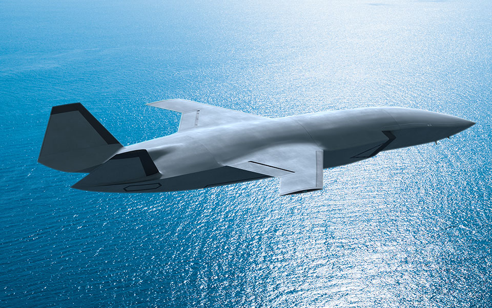 gray-mq28-boeing-flying-over-blue-water