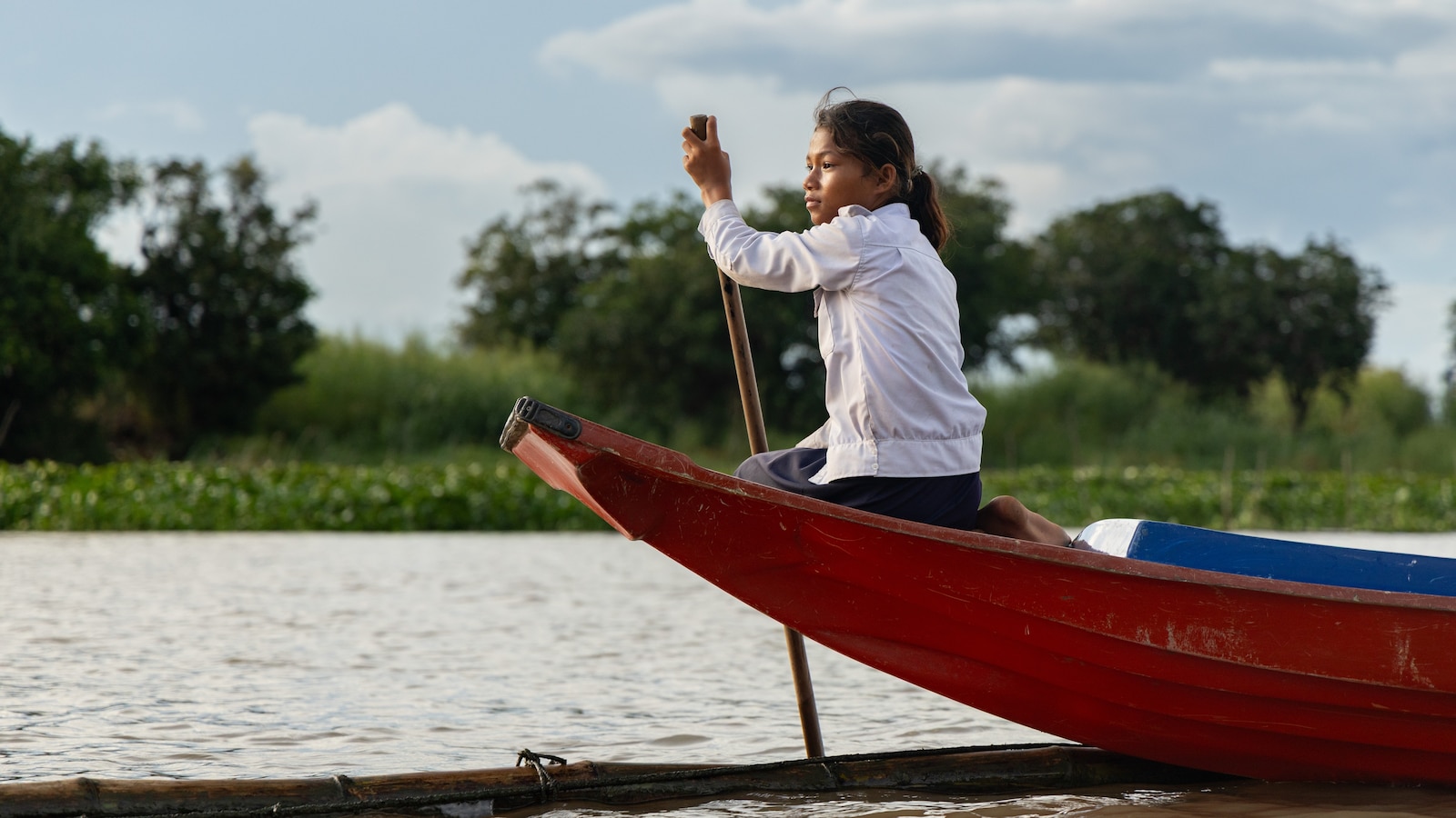 Photos show Cambodian children attend school in floating villages along the Tonle Sap lake.