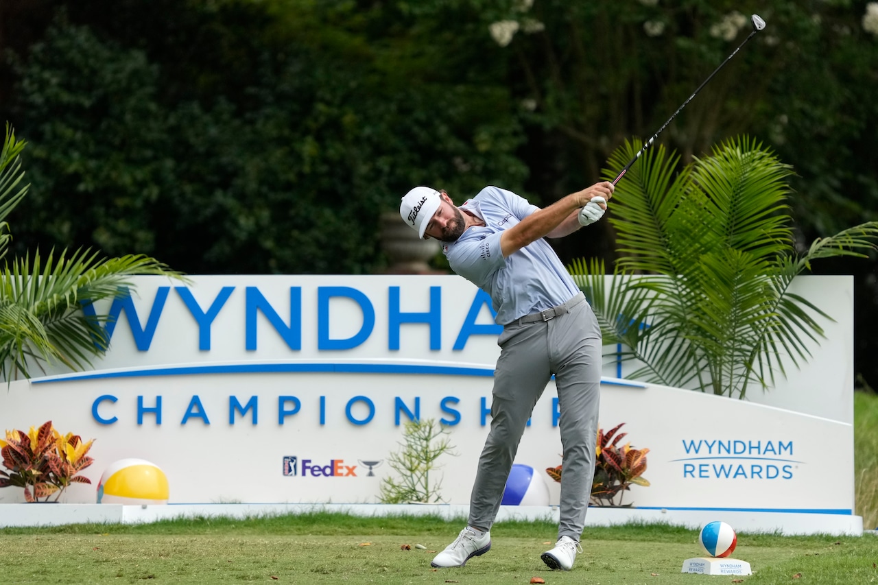 PGA Tour golfer Cameron Young holds his follow through after hitting a tee shot at the 2025 Wyndham Championship.