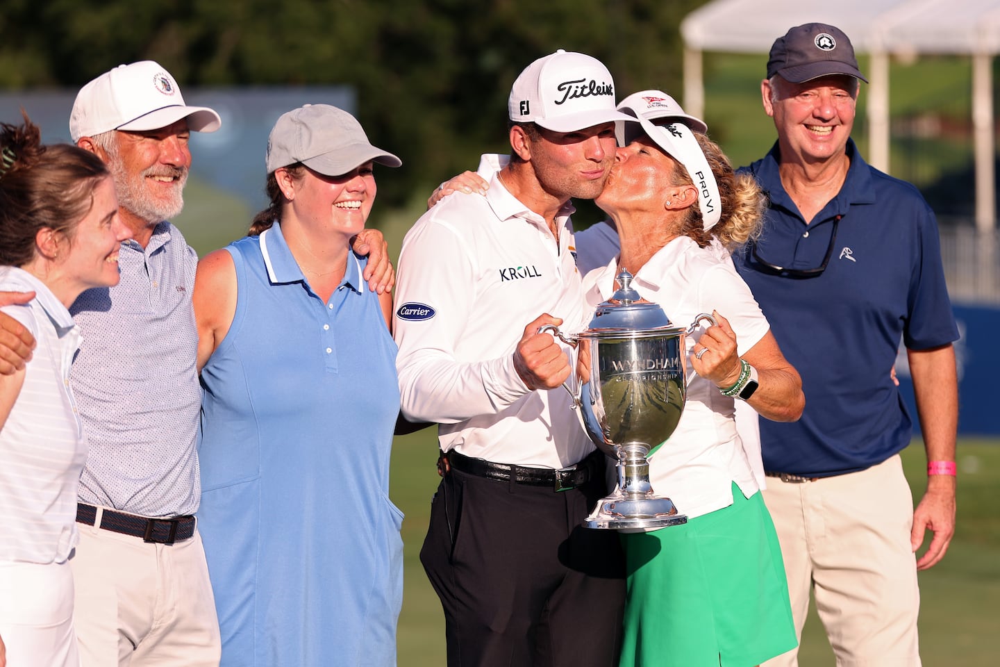 It was a great final round for Michael Brennan at the Wyndham Championship as he got a trophy for winning, and a kiss from mom Shannon, Sunday at Sedgefield Country Club in Greensboro, N.C.