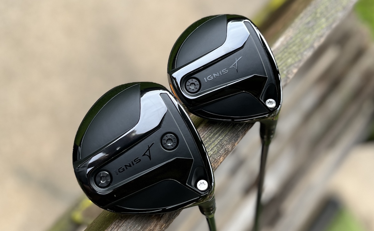 Takomo Ignis D2 3 and 5 wood heads sole-up on a wooden rail