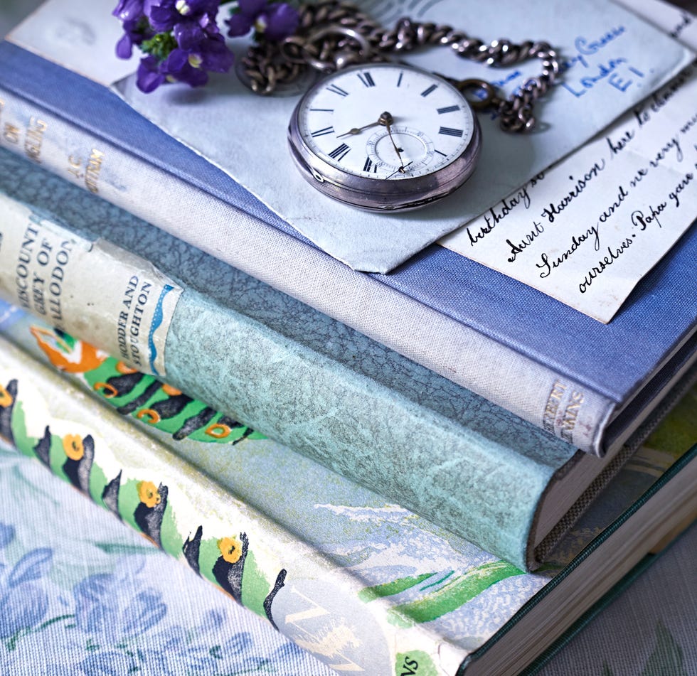 old fashioned fob watch, lilac flower, on letters on books, vintage, nostalgia