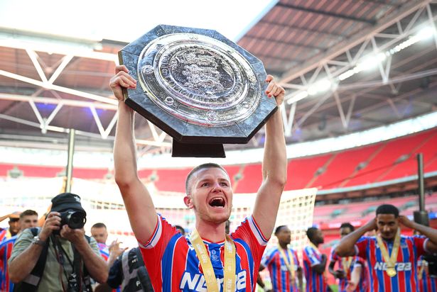 Adam Wharton of Crystal Palace holds the Community Shield 