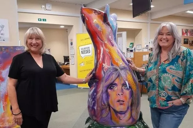 Maggi Ronson, left, sister of the late Mick Ronson, and Susan J. Woolhouse with Moonage Daydream rat