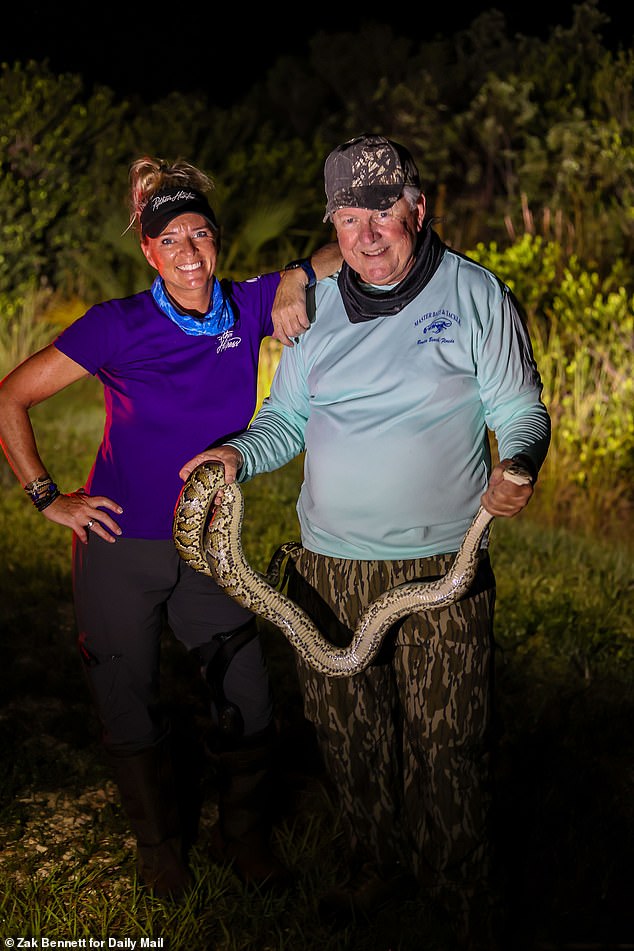 Tourists like Jim Gillenwater from Indiana joined Siewe in the swamp the night Daily Mail was there, experiencing the thrill of the hunt firsthand