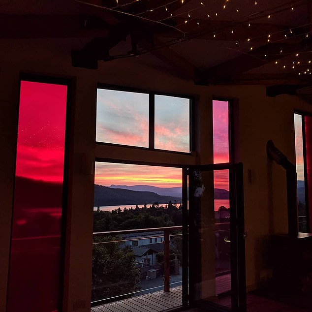 The mansion has balcony views of England's largest lake and the fells beyond