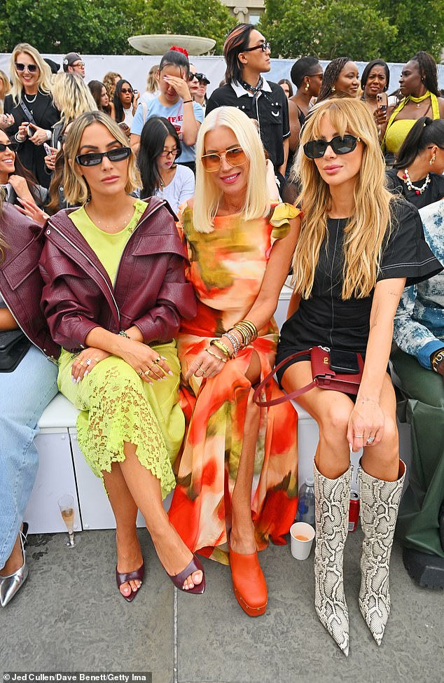 Denise van Outen looked incredible for the event as she wore a long-sleeved red, orange and white summer dress