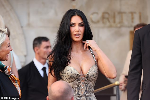 Kardashian¿s latest hair change is part of her ongoing style evolution, from platinum blonde to dark chocolate, proving she loves mixing things up; (seen in June)