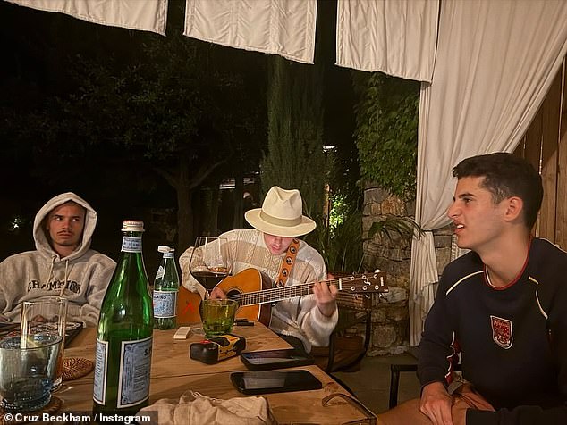 When he reached for his guitar, followers were tickled by an image showing Romeo giving him 'side eye' while he performed for three generations of Beckhams as well as their pal Ahmed Alsibai