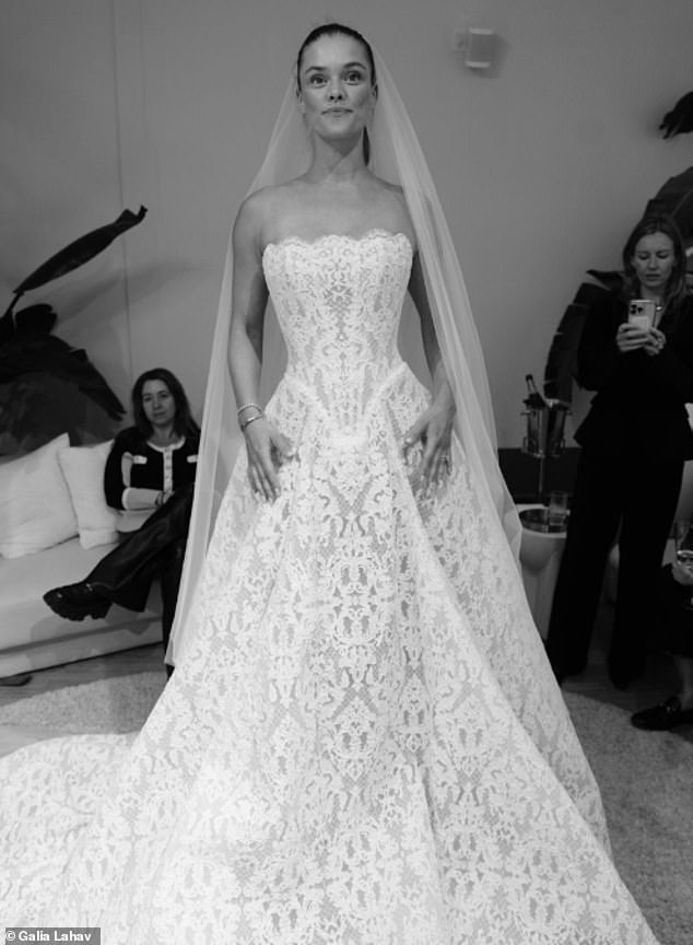 The cover girl had friends and family around her during the fitting
