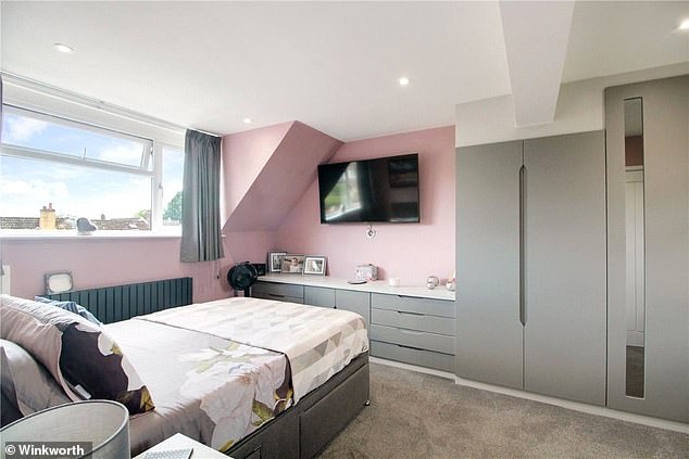 Restful: One of the four bedrooms in Karl Lake's house now up for sale