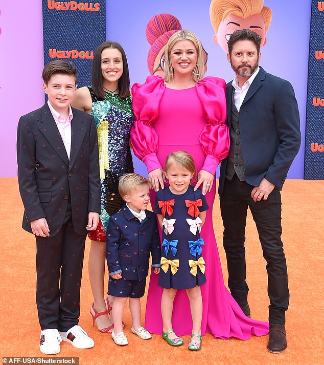 Savannah concluded with a photo featuring her late father, her husband Quentin Lee, their son Lake, three, and Blackstock's children with Clarkson: daughter River, 11, and son Remington, nine; (L–R) Seth and Savannah Blackstock; Remington, River and Kelly Clarkson; and Brandon Blackstock pictured in 2019 in LA