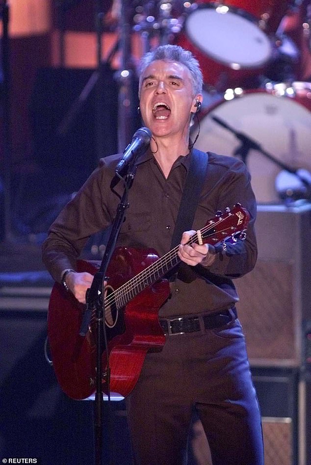 While discussing his upcoming album 'Who Is The Sky?' with The Times, he referred to Gaonkar as his 'fiancée'; Byrne is pictured performing in 2002