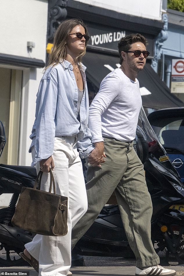 The Irish singer, 31, looked in good spirits as he browsed furniture and home decor shops, after he reportedly splashed the cash on a new luxury 'six bedroom family' home in West London
