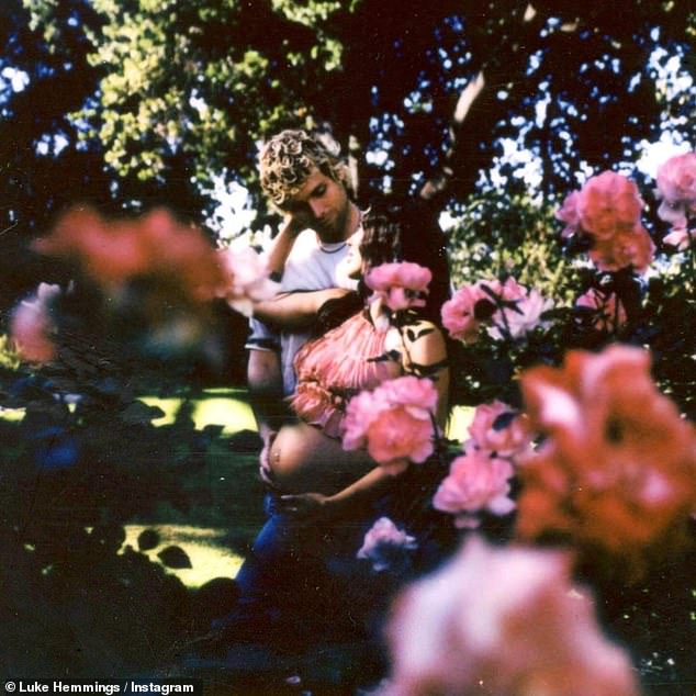 In the blurry, vintage-style pictures, Luke and Sierra can be seen holding their hands on Sierra's belly while in a rose garden