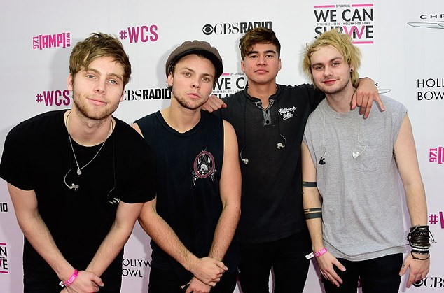 5SOS were last spotted together in Europe during their world tour in 2023 (Luke pictured alongside Ashton Irwin, Calum Hood and Michael Clifford)