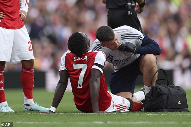 There were worrying scenes at the Emirates as Saka was tended to on the pitch for some time