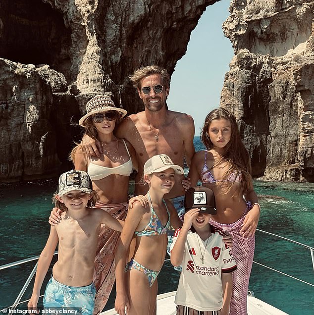 Abbey Clancy has given fans another insight into her summer holiday with a stunning picture of her, Peter Crouch and their children that she shared to Instagram on Saturday