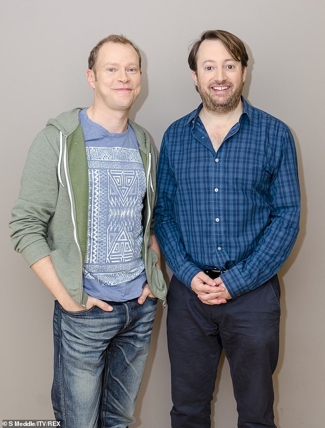 Speaking alongside long-term comedy partner Robert Webb (left), Mitchell added that male friendships often revolve around what he calls 'a little mutual explain'