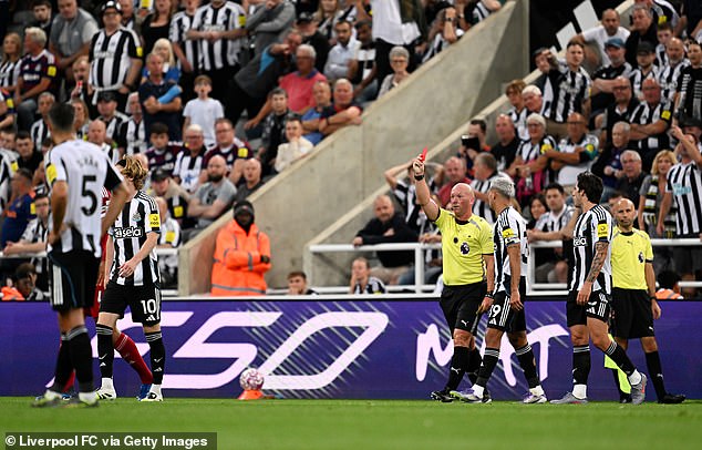 Referee Simon Hooper was sent to the monitor and changed his decision to a red card