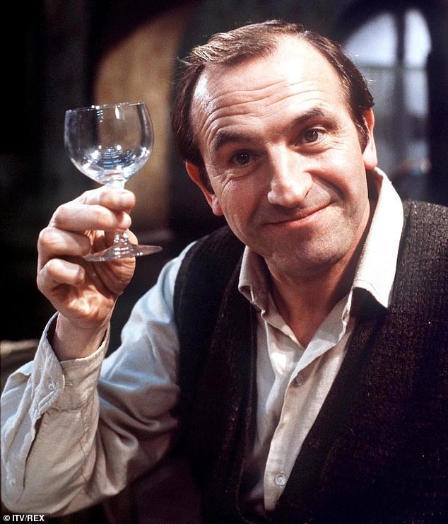 Award-winning British sitcom Rising Damp has been slapped with trigger warnings for 'discriminatory language' (Pictured: Leonard Rossiter as Rupert Rigsby)