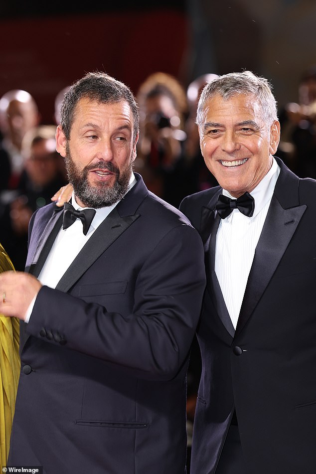 The pair posed together in their matching suits and bow ties