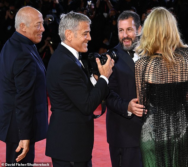 George was seen chatting with his co-stars Adam Sandler and Laura Dern
