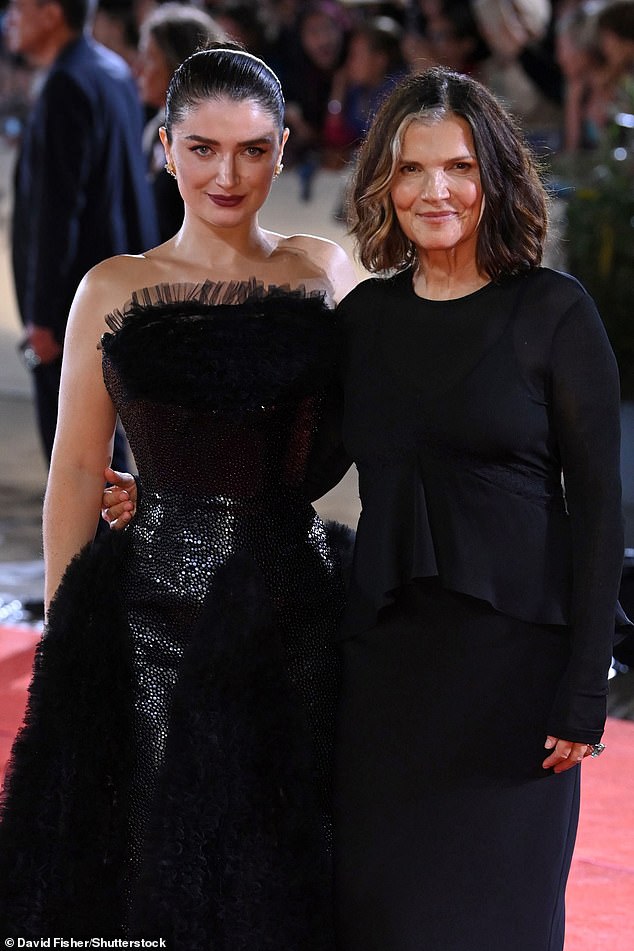 Eve brought the drama in a black sequined gown complete with mesh detailing
