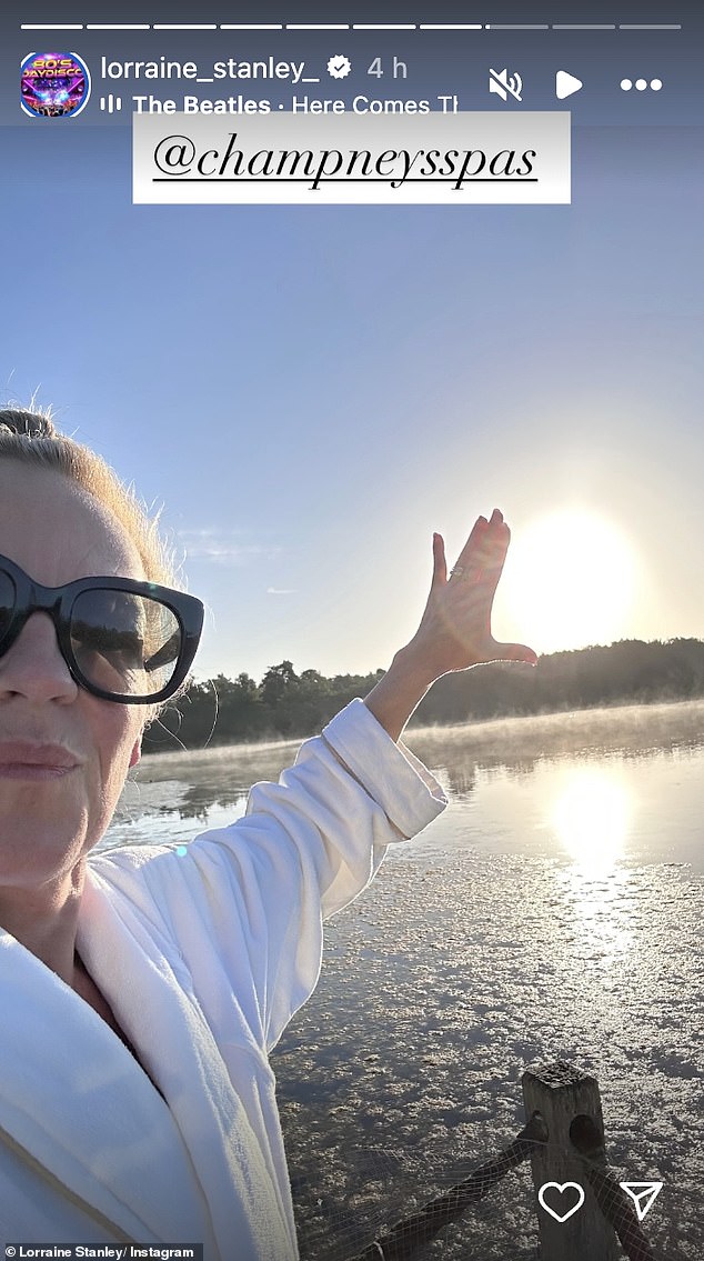 Lorraine posed with red heart-shaped balloons in her hotel room, complete with wedding decor and plush white robes - before heading out to enjoy the sunshine and fresh air