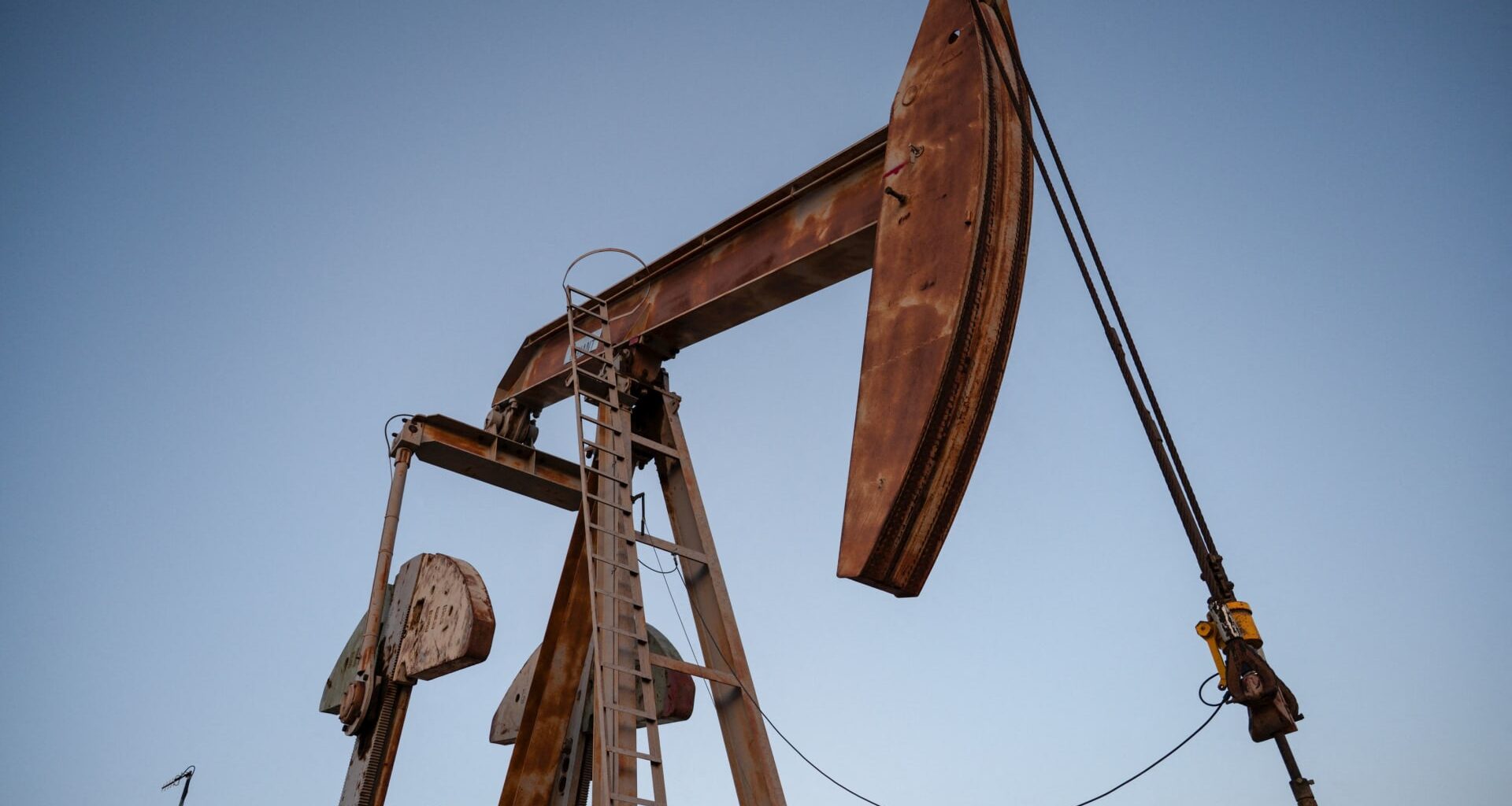 Oil edges up on US crude stocks drop, impact of US tariffs on India