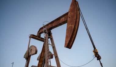 Oil edges up on US crude stocks drop, impact of US tariffs on India
