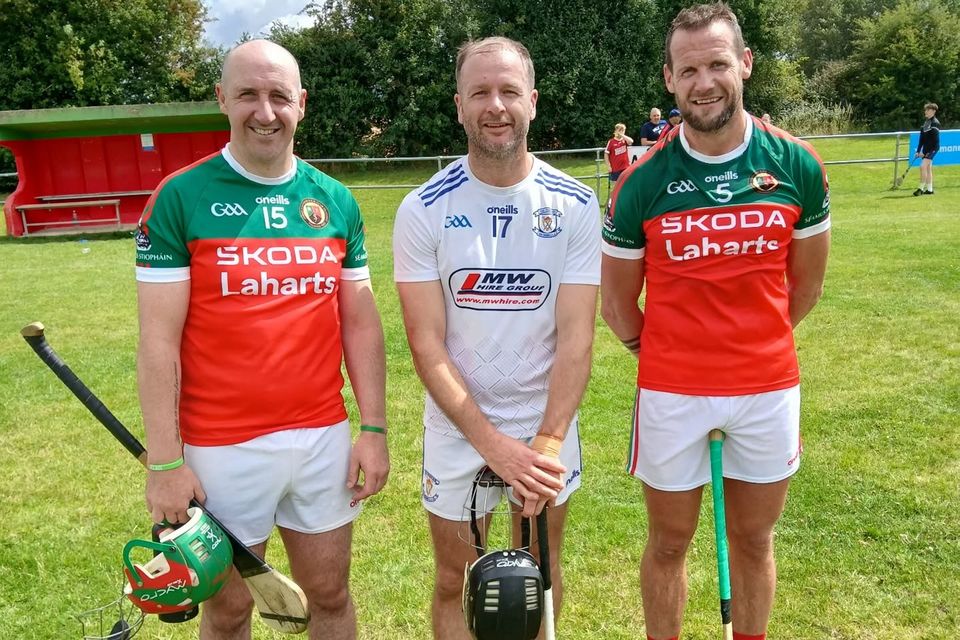 Jackie Tyrrell (right) with fellow James Stephens clubman Eoin Larkin (left) and their former Kilkenny teammate  JJ Delaney during their recent junior quarter-final clash with Fenians