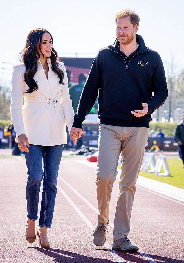 THE HAGUE, NETHERLANDS - APRIL 17: Meghan, Duchess of Sussex and Prince Harry, Duke of Sussex attend day two of the Invictus Games 2020 at Zuiderpark on April 17, 2022 in The Hague, Netherlands. (Photo by Patrick van Katwijk/Getty Images)