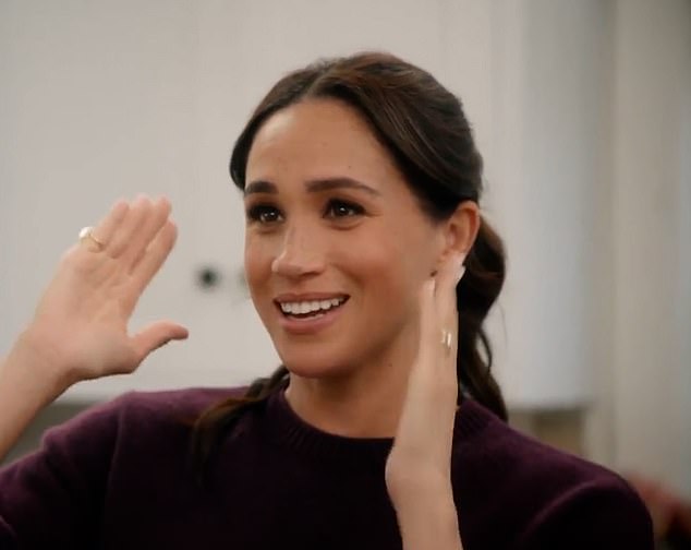 Uncl grabs: With Love Meghan/talking about being a briefcase girl on Deal or No Deal - Credit: Netflix / With Love, Meghan