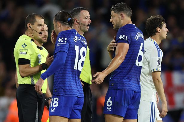Jack Grealish and James Tarkowski have words with the officials at full time