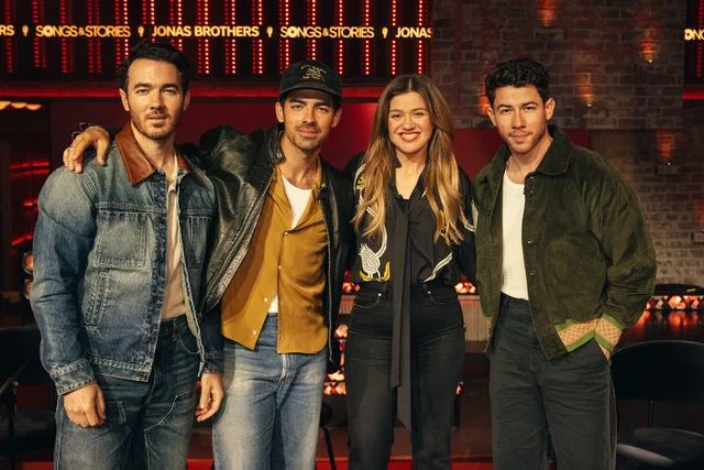 Weiss Eubanks/NBCUniversal via Getty Kevin Jonas, Joe Jonas, Kelly Clarkson and Nick Jonas on 'Songs & Stories with Kelly Clarkson'