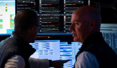 Wall Street closes out a wild month on a subdued note