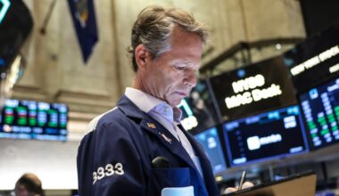 Wall Street gains as oil ends lower in volatile trade