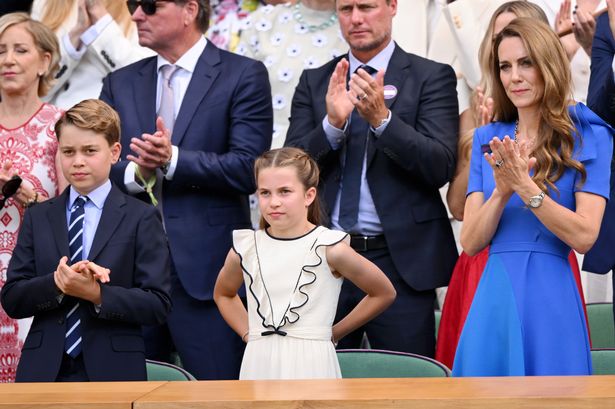 George alongside mum Kate and younger sister Princess Charlotte 